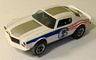 AFX Camaro Z-28 slotcar, white with red, blue, and silver #6 Cat's Eyes version