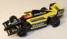 Tomy F1 Valvoline Armor All car in yellow with black #1